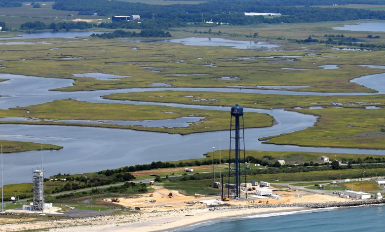 Rocket Lab's Neutron launch site under construction in Virginia, with its Assembly and Integration Complex for the rocket in the background